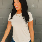 Short sleeved round neck super soft basic top in natural.