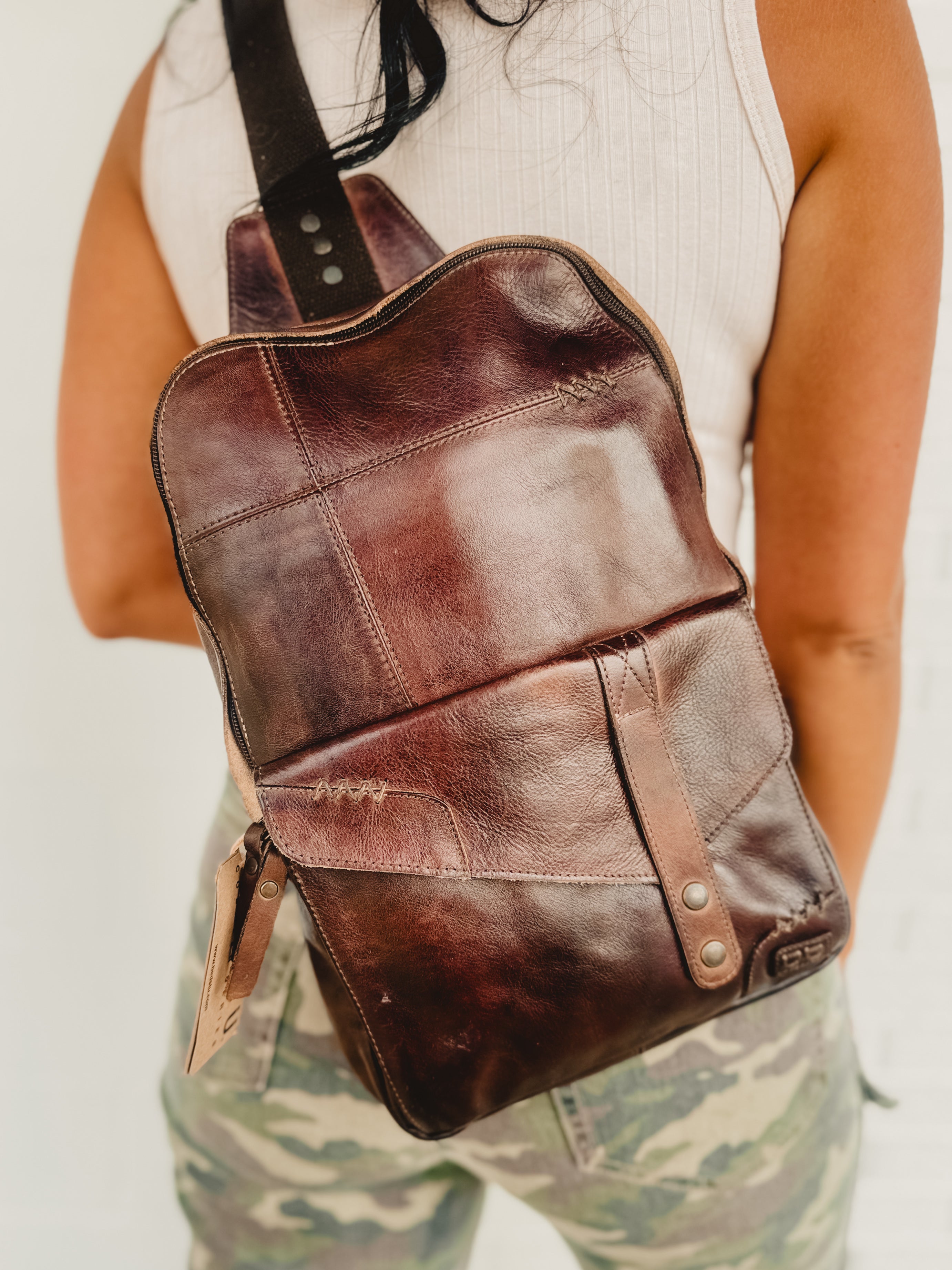 Genuine leather in the color teak rustic sling bag made by Bedstu.