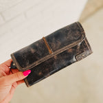 Bedstu Canton leather wallet with magnetic closure, zipper compartment, and card and cash storage in black lux.