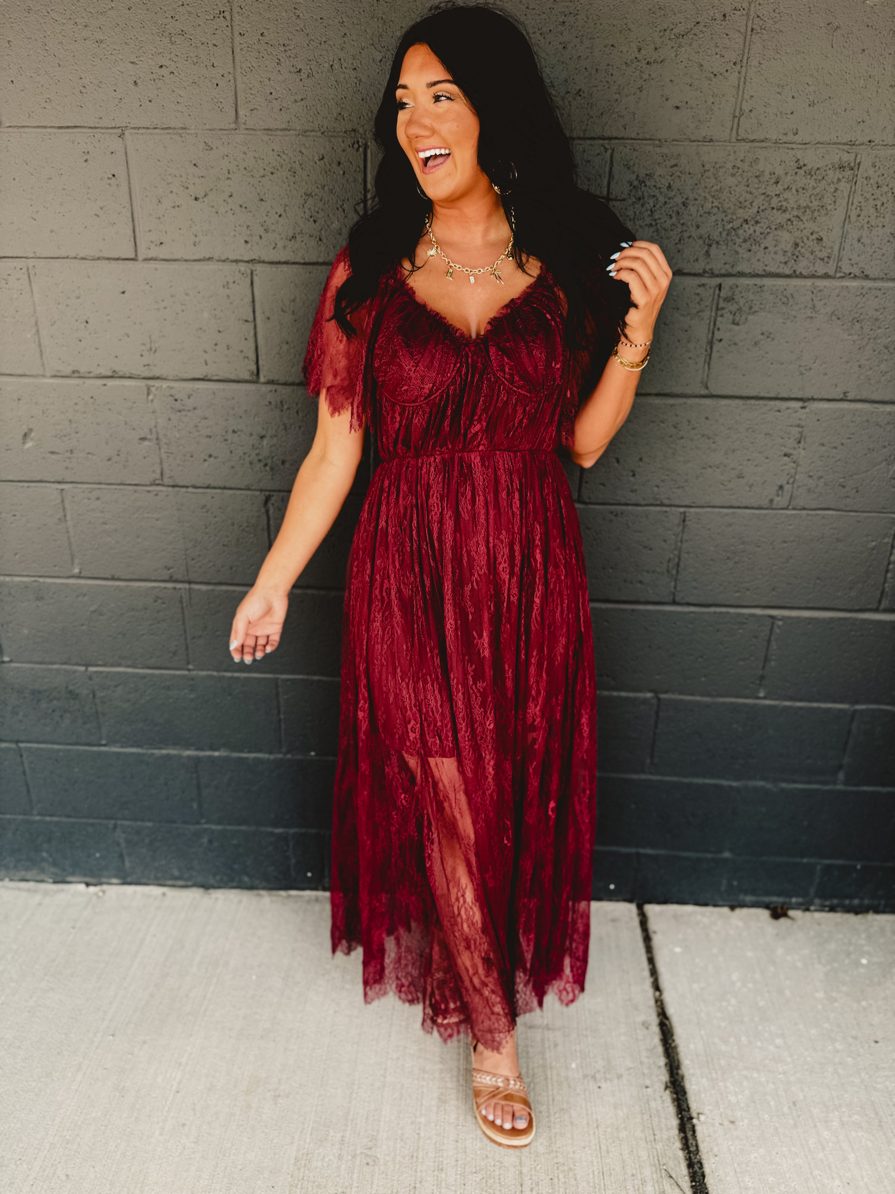 Short sleeve v-neck maxi lace overlay dress in the color wine.