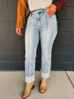 High waisted front seam cuffed straight jeans by Risen in medium denim.