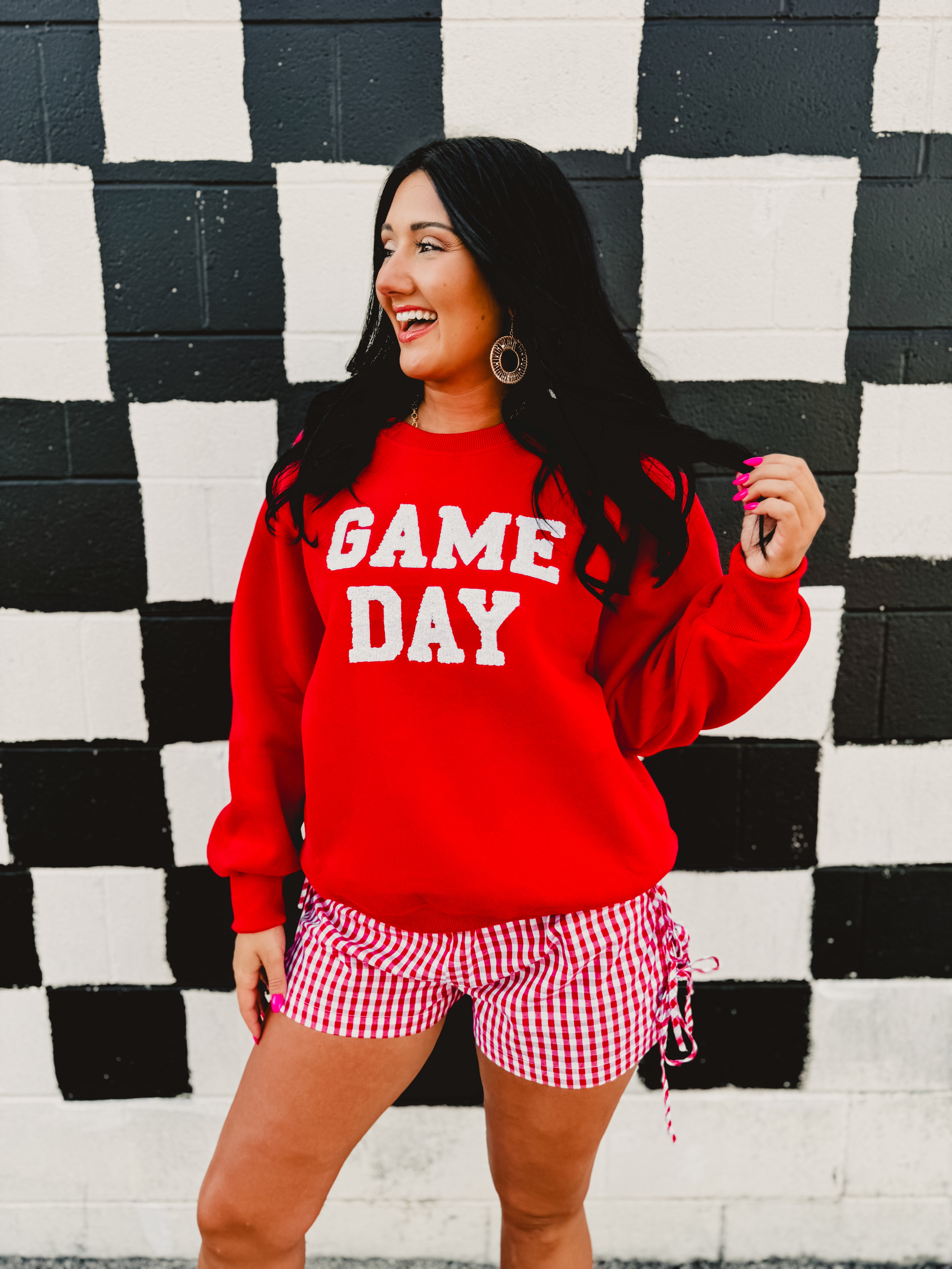 "Game Day" patch lettered red round neck sweatshirt.