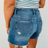 Co-Pilot High Rise Distressed Shorts - Medium Wash - Lace and Grace Boutique