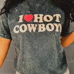 Mineral wash black 100% cotton graphic tee that reads "I love hot cowboys."