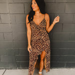 Asymmetrical v-neck leopard ruffle trim spaghetti strap midi length dress.