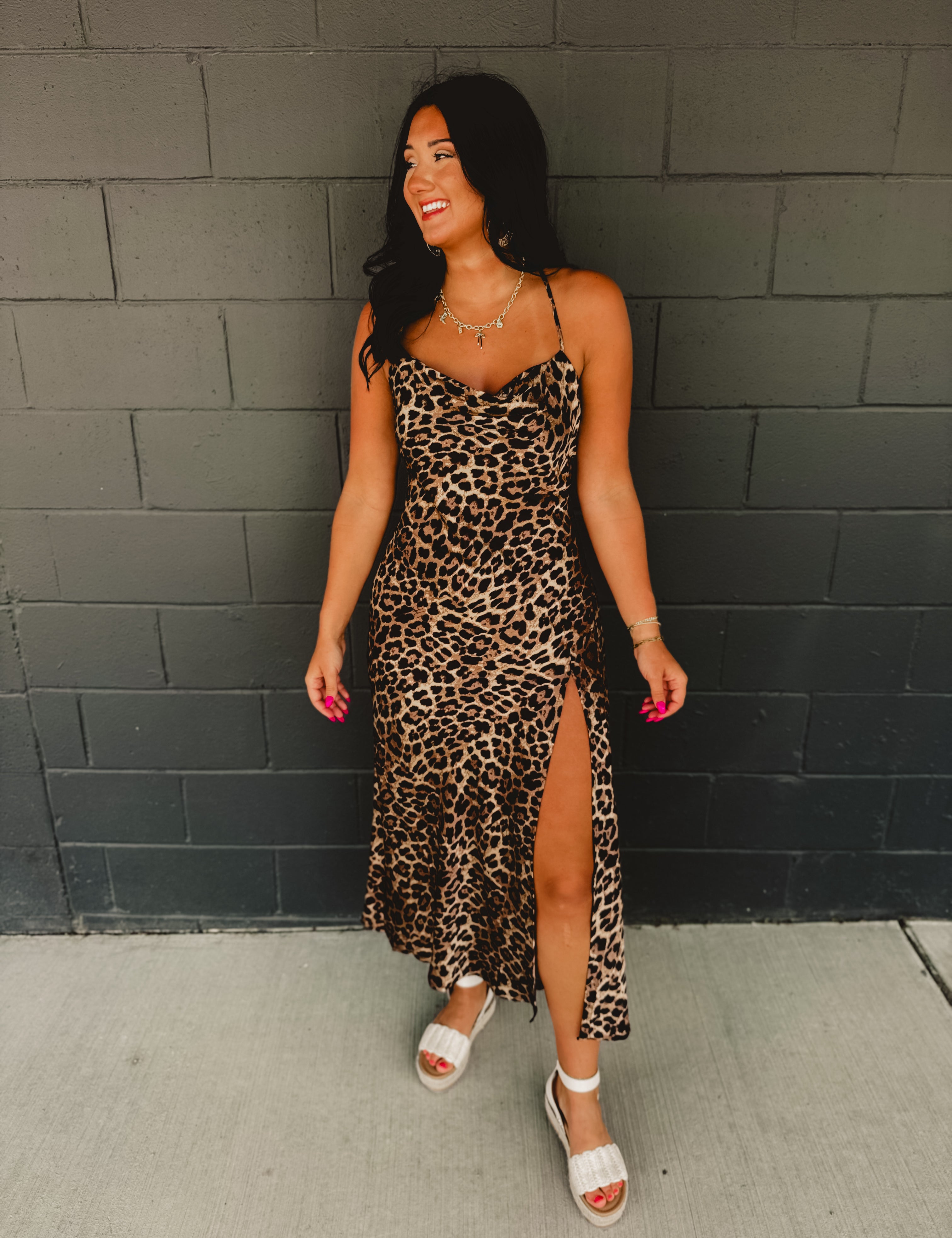 Cowl neckline spaghetti strap satin leopard print maxi dress with high side slit.