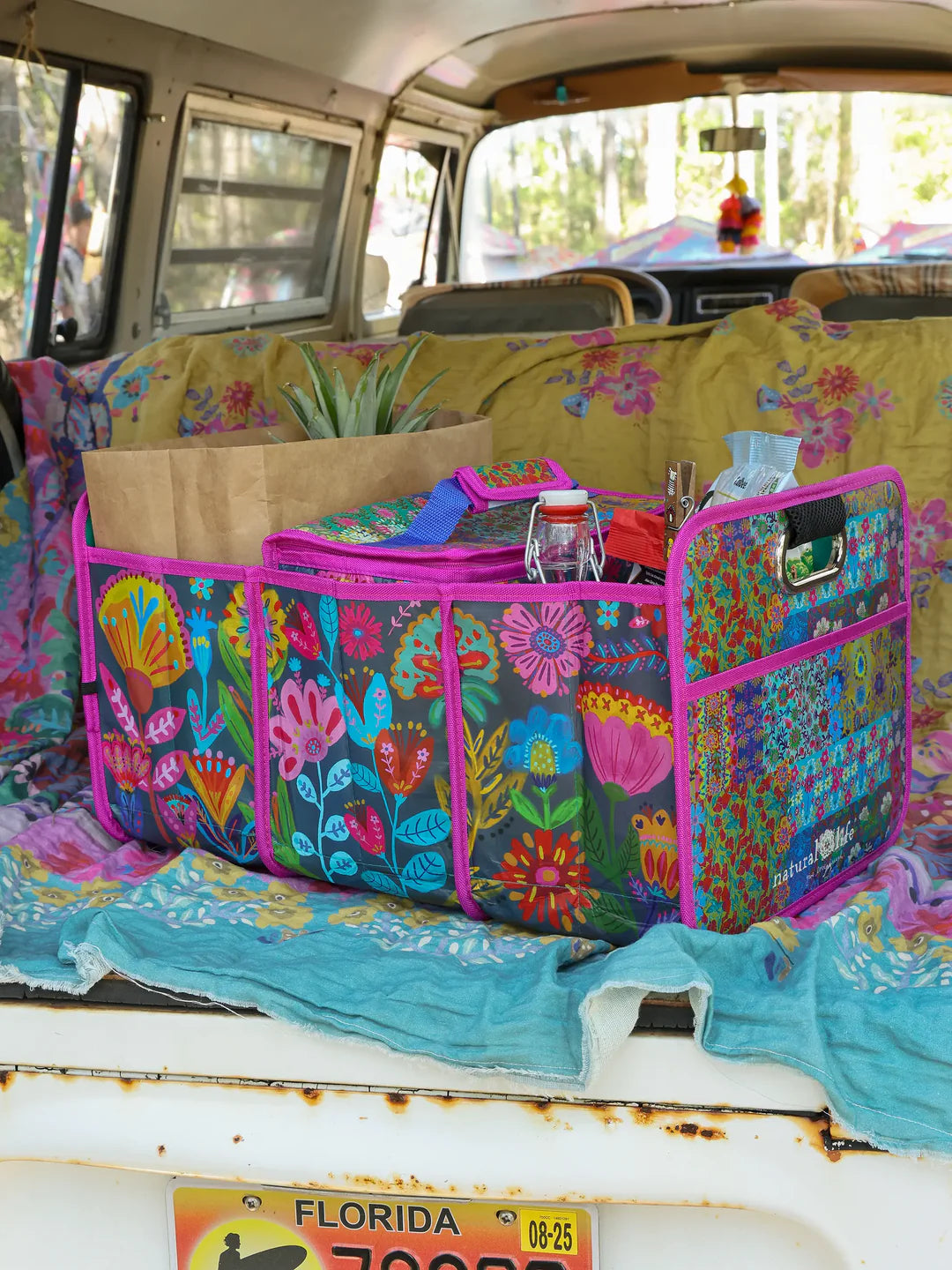 Natural Life car trunk organizer featuring three different compartments and a removable insulated cooler in Navy Folk Flower.