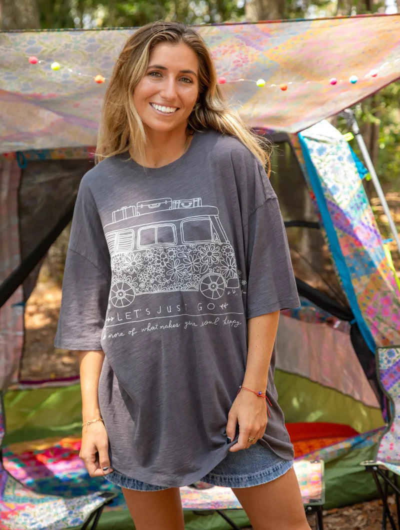 Drop shoulder short sleeved Natural Life "Let's Just Go, do more of what makes you happy" one sized graphic tee in washed black.
