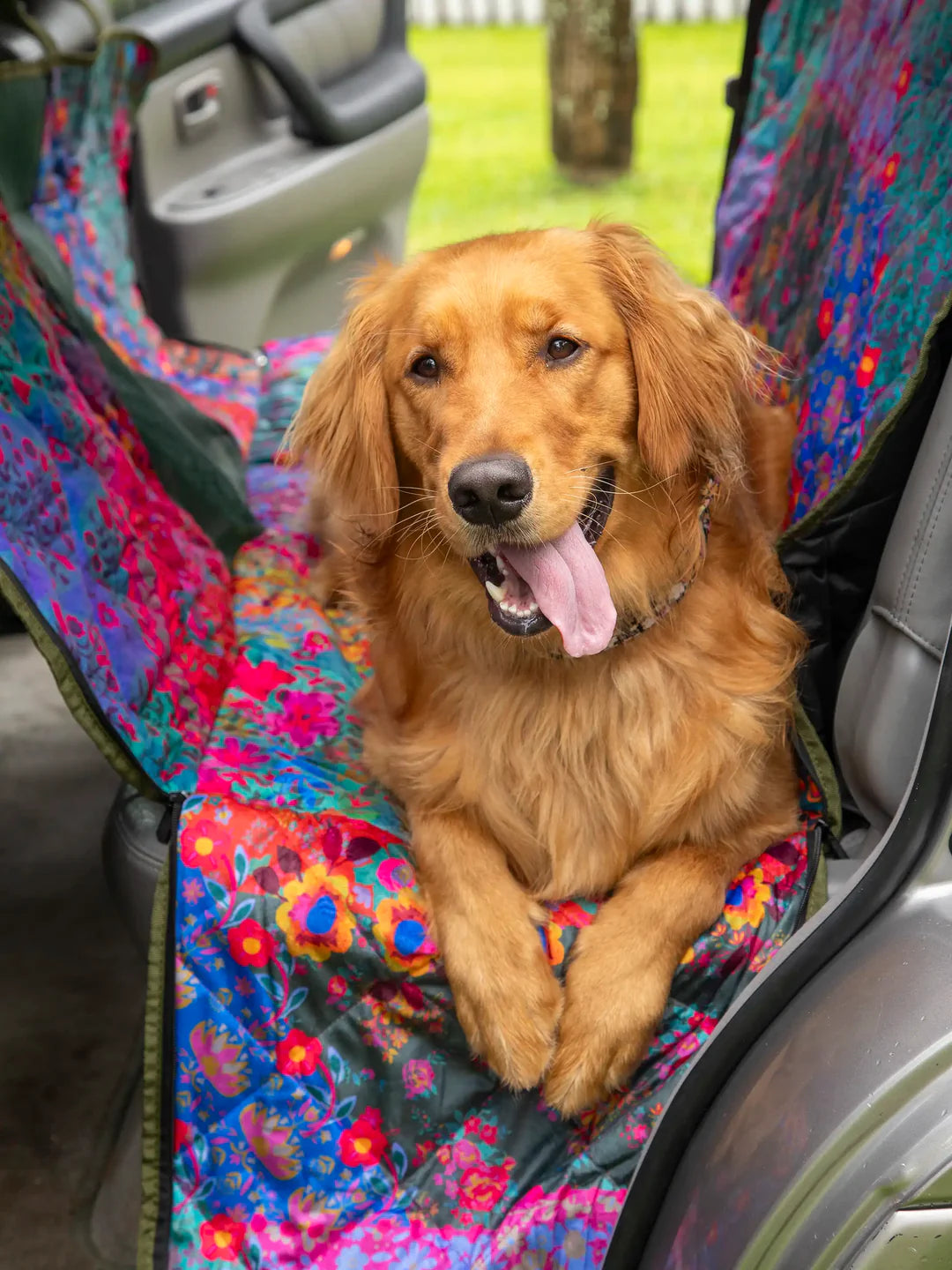 Backseat cover pet hammock to protect your car seats from hair and messes featuring center mesh for pet visibility, washable and water-resistant fabric, and easy installation by Natural Life.