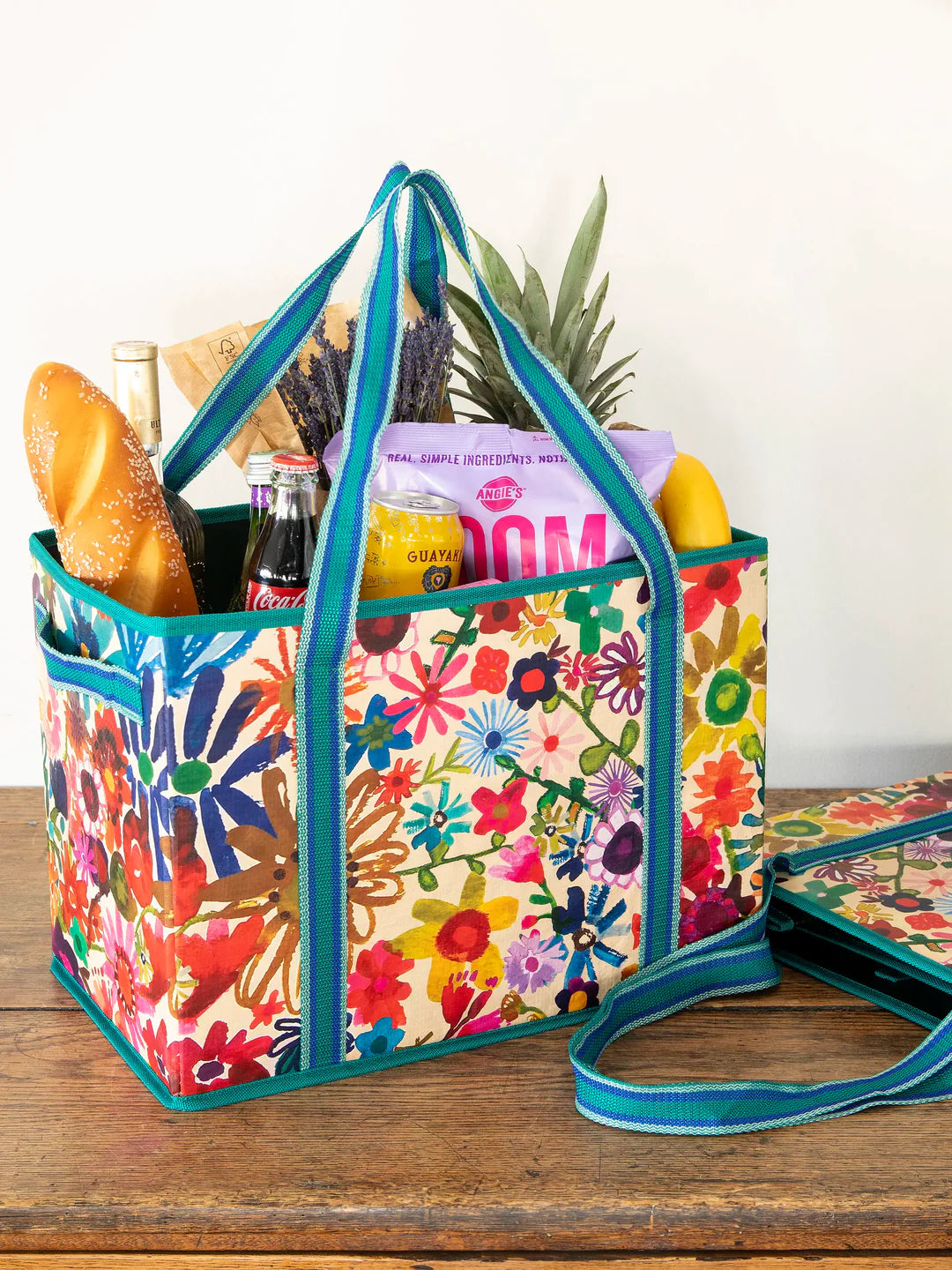 Reusable grocery tote in bright floral by Natural Life.