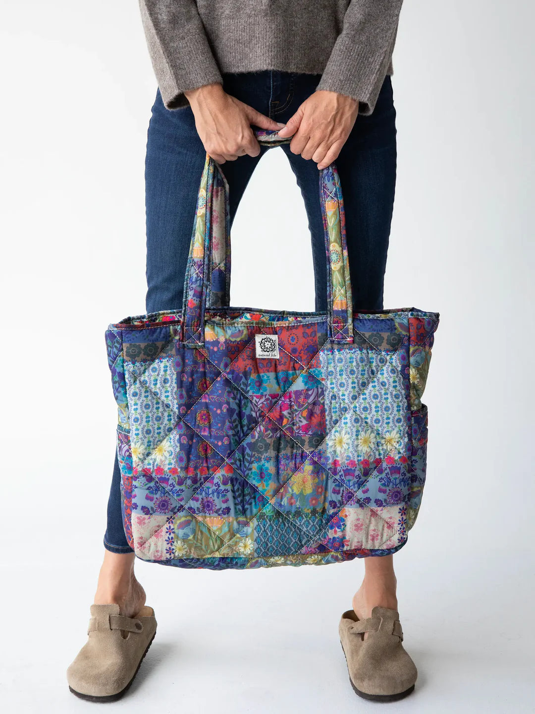 Colorful reversible puffy tote bag by Natural Life.