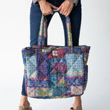 Colorful reversible puffy tote bag by Natural Life.