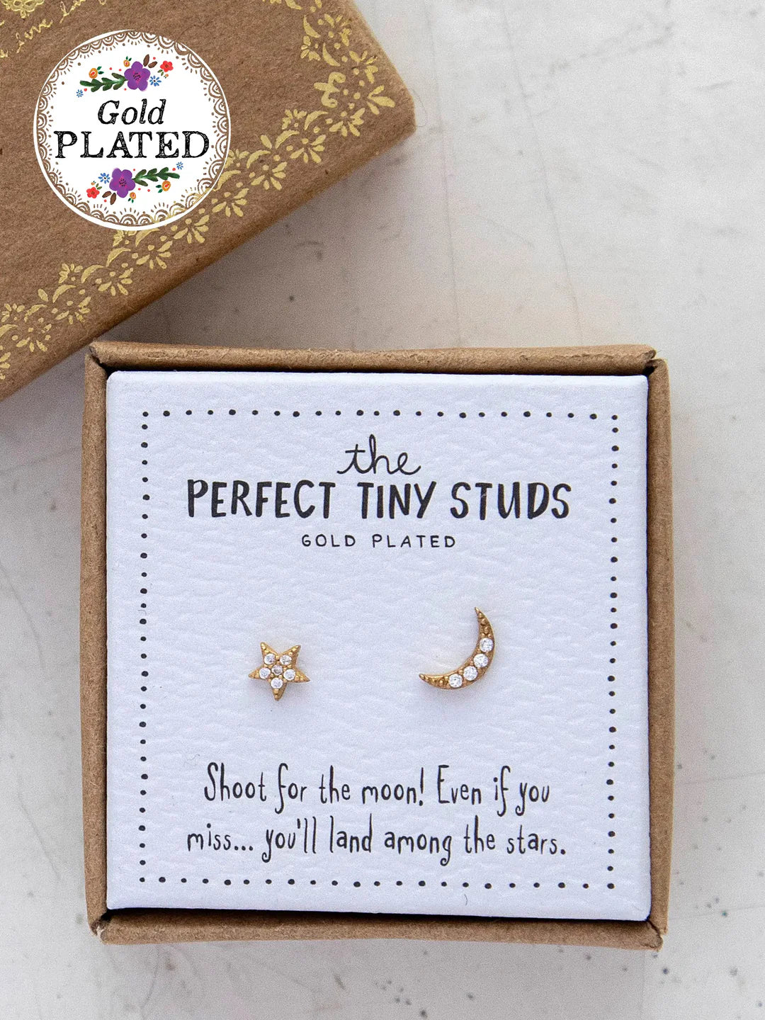 Gold-plated sun and moon stud earrings by Natural Life.
