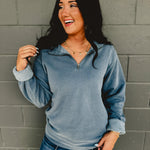 Long sleeve zip-up blue pigment-dyed pullover.