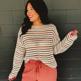 Open crochet boat neck long sleeve sweater with drop shoulders and stripes in multicolor.