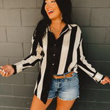 Striped satin button-up oversized blouse.