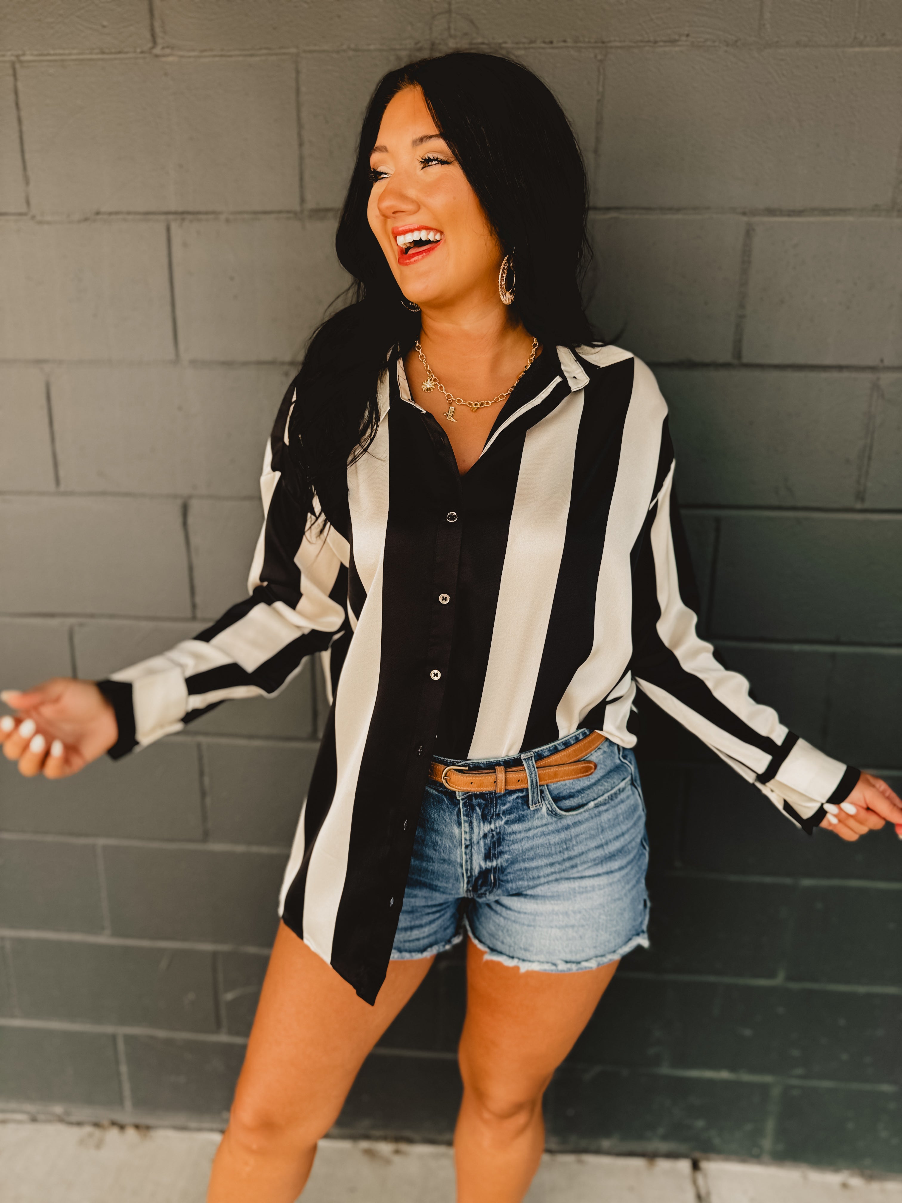 Striped satin button-up oversized blouse.