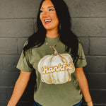 "Thankful" pumpkin autumn short sleeved graphic tee with a round neck and full length in moss green.