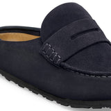 Close detail of the midnight navy Naples clog stitching and suede texture