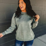 Acid washed long sleeve crew neckline sweatshirt in ash jade.