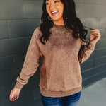 Acid washed crewneck long sleeve sweatshirt in brown.