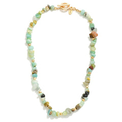 Stone and gold beaded necklace with circle closure.