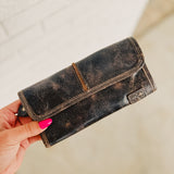 Bedstu Canton leather wallet with magnetic closure, zipper compartment, and card and cash storage in black lux.