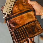 Bedstu wallet with card storage, magnet closure, and an inside compartment.