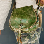 Bedstu brand genuine leather crossbody purse with magnet closure and built in compartments.
