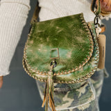 Bedstu brand genuine leather crossbody purse with magnet closure and built in compartments.