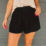 Dress up or down with the pleated linen blend zip-up Bermuda shorts with button detail. 