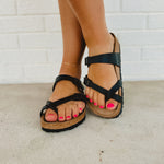 Birkenstock mayari black toe ring and buckle sandals.