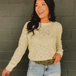 Cutout crochet detail long sleeve knit sweater in natural.