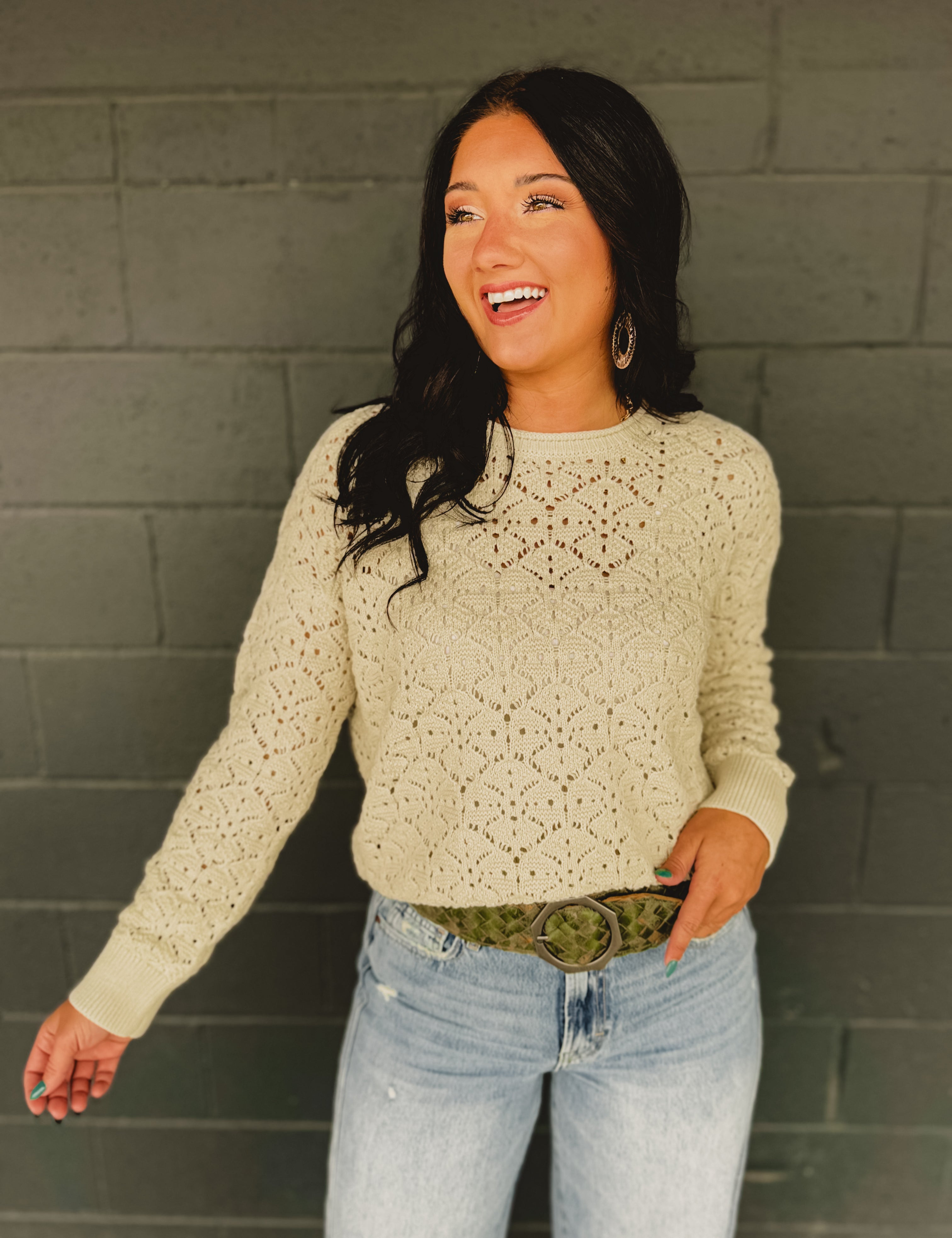Cutout crochet detail long sleeve knit sweater in natural.