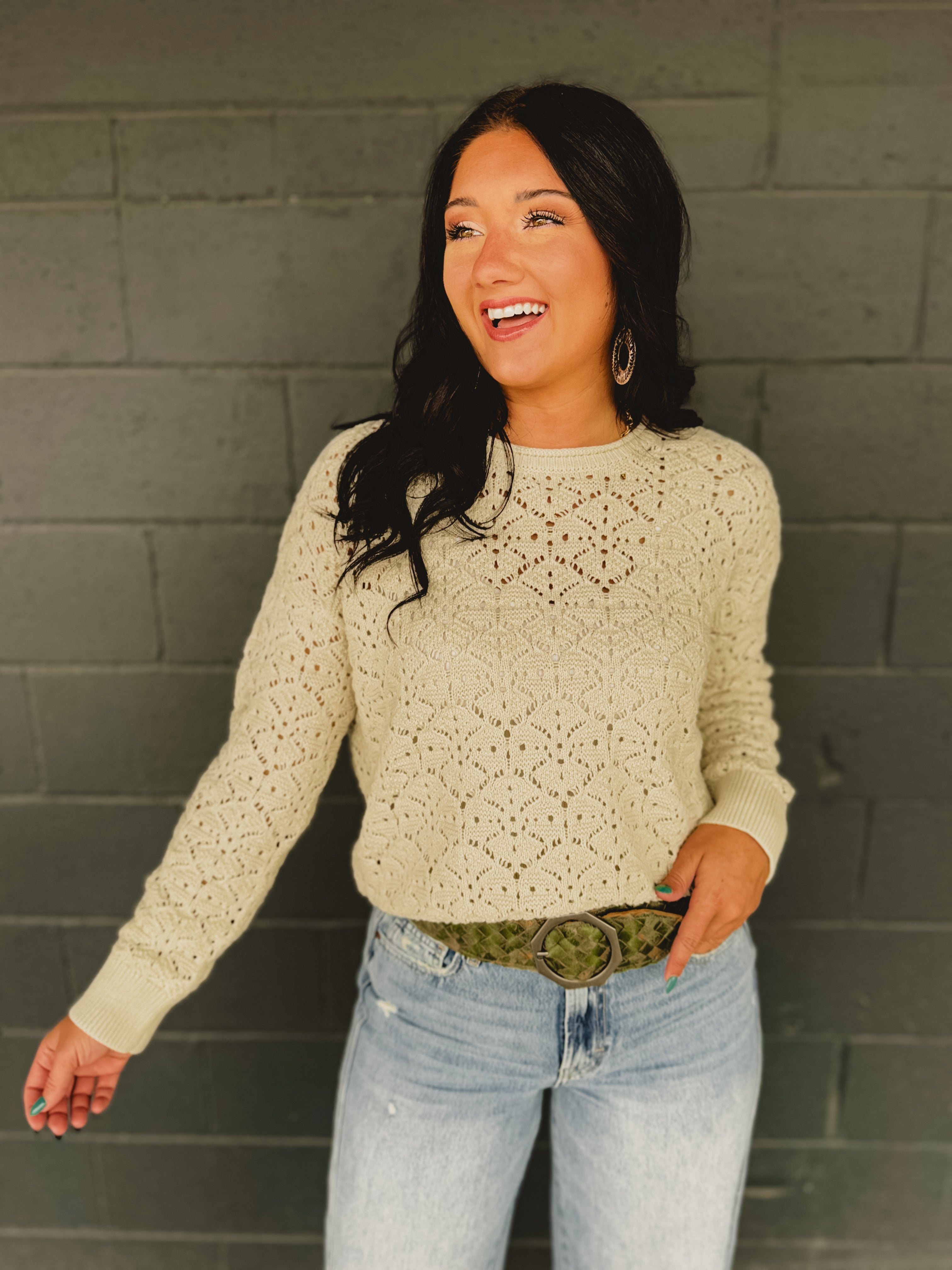 Cutout crochet detail long sleeve knit sweater in natural.