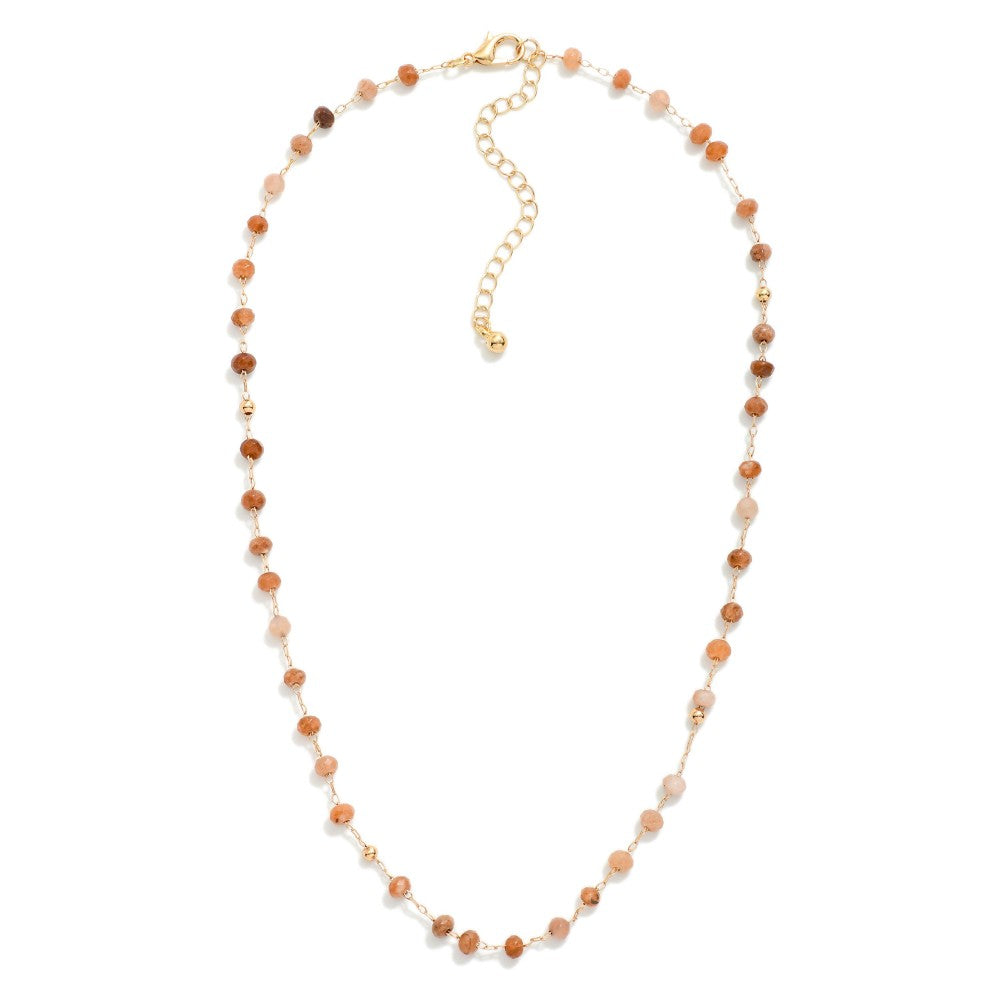 Peach hue beaded dainty necklace.