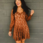 Sweetheart neckline fit and flare mini dress with hidden zipper, elastic sleeves, and partial smocked back bodice in chocolate.