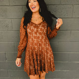 Sweetheart neckline fit and flare mini dress with hidden zipper, elastic sleeves, and partial smocked back bodice in chocolate.