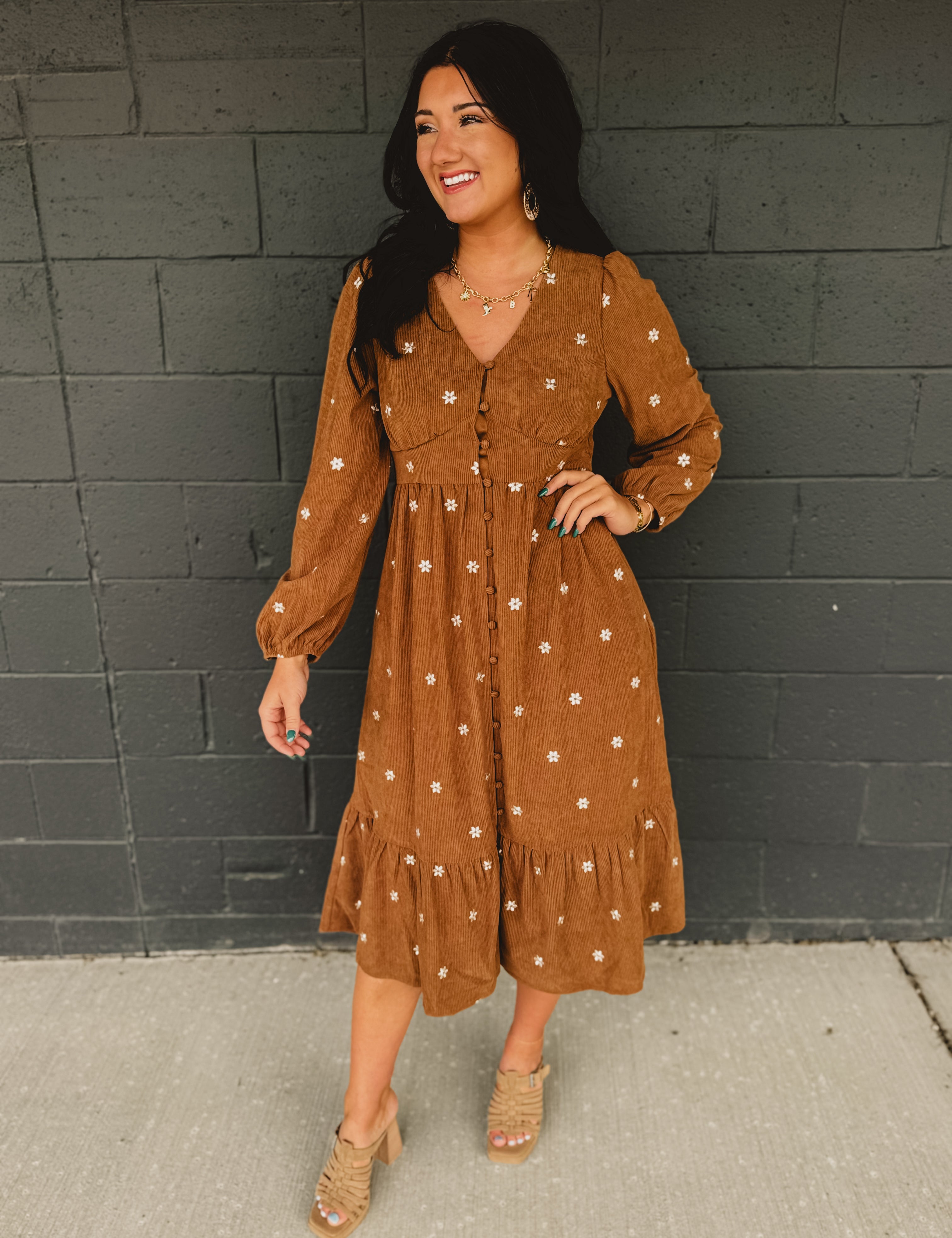Button up brown corduroy long sleeve maxi dress with floral embroider.