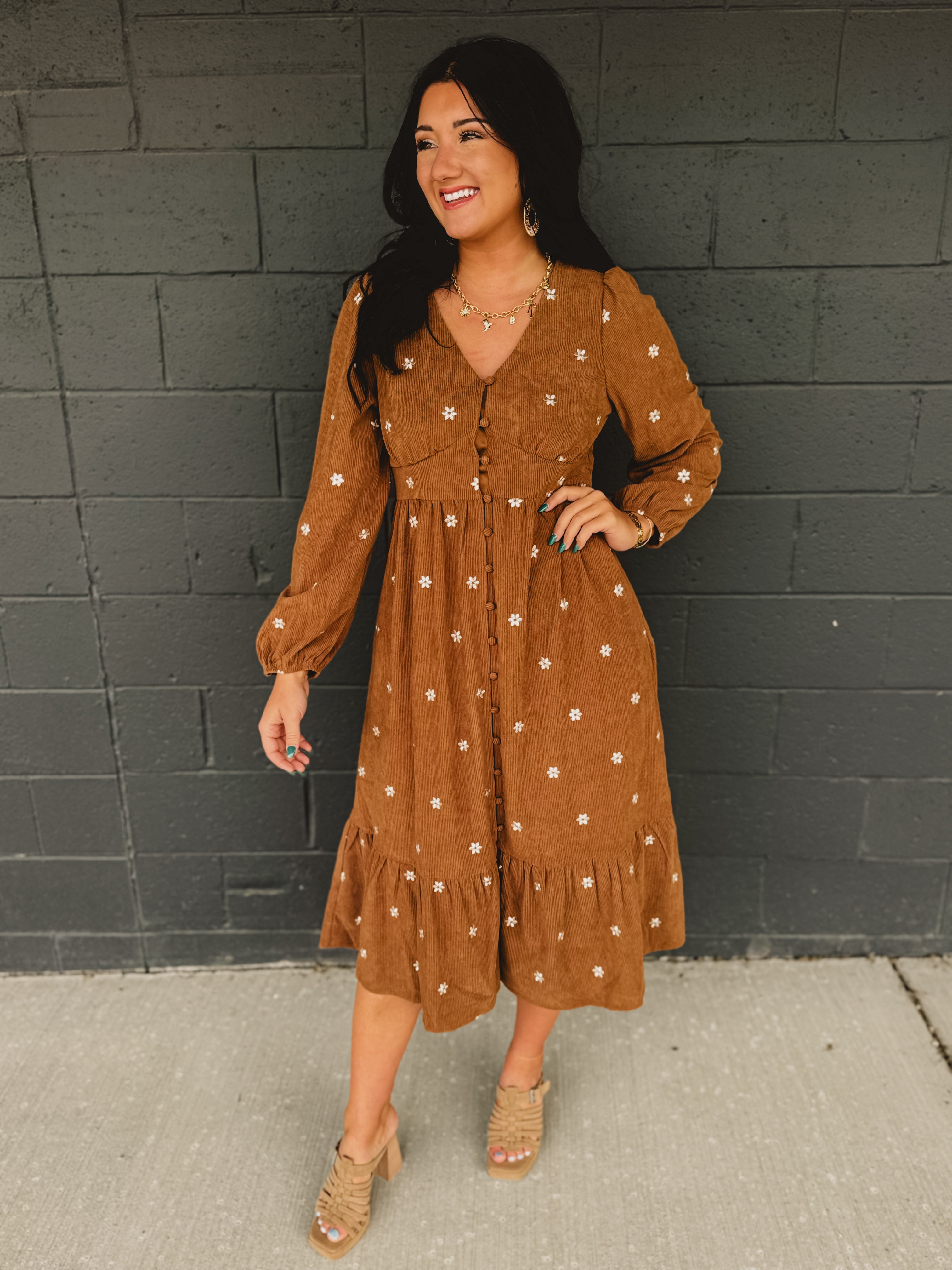 Button up brown corduroy long sleeve maxi dress with floral embroider.
