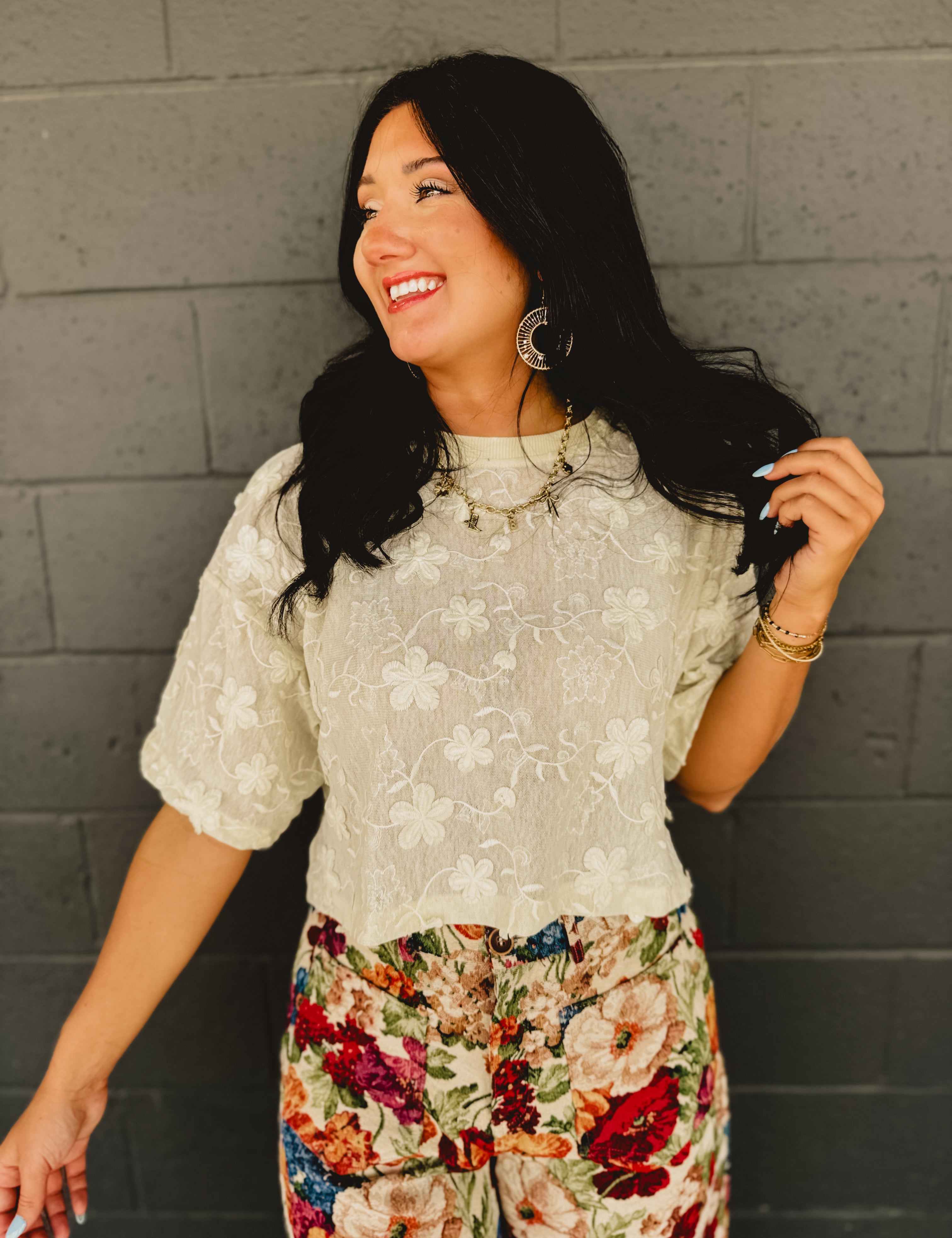 Lace floral embroidered sheer short sleeved drop shoulder top in cream.