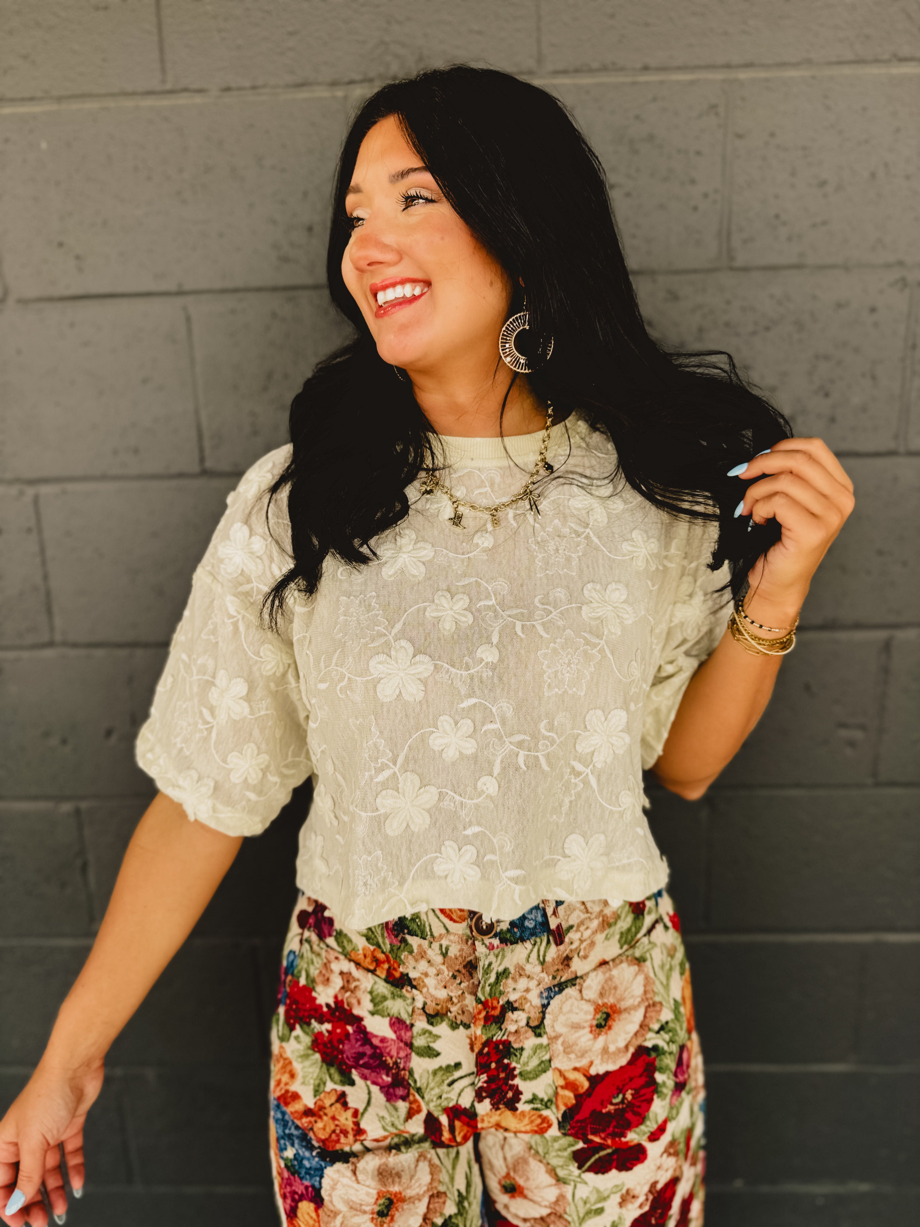 Lace floral embroidered sheer short sleeved drop shoulder top in cream.