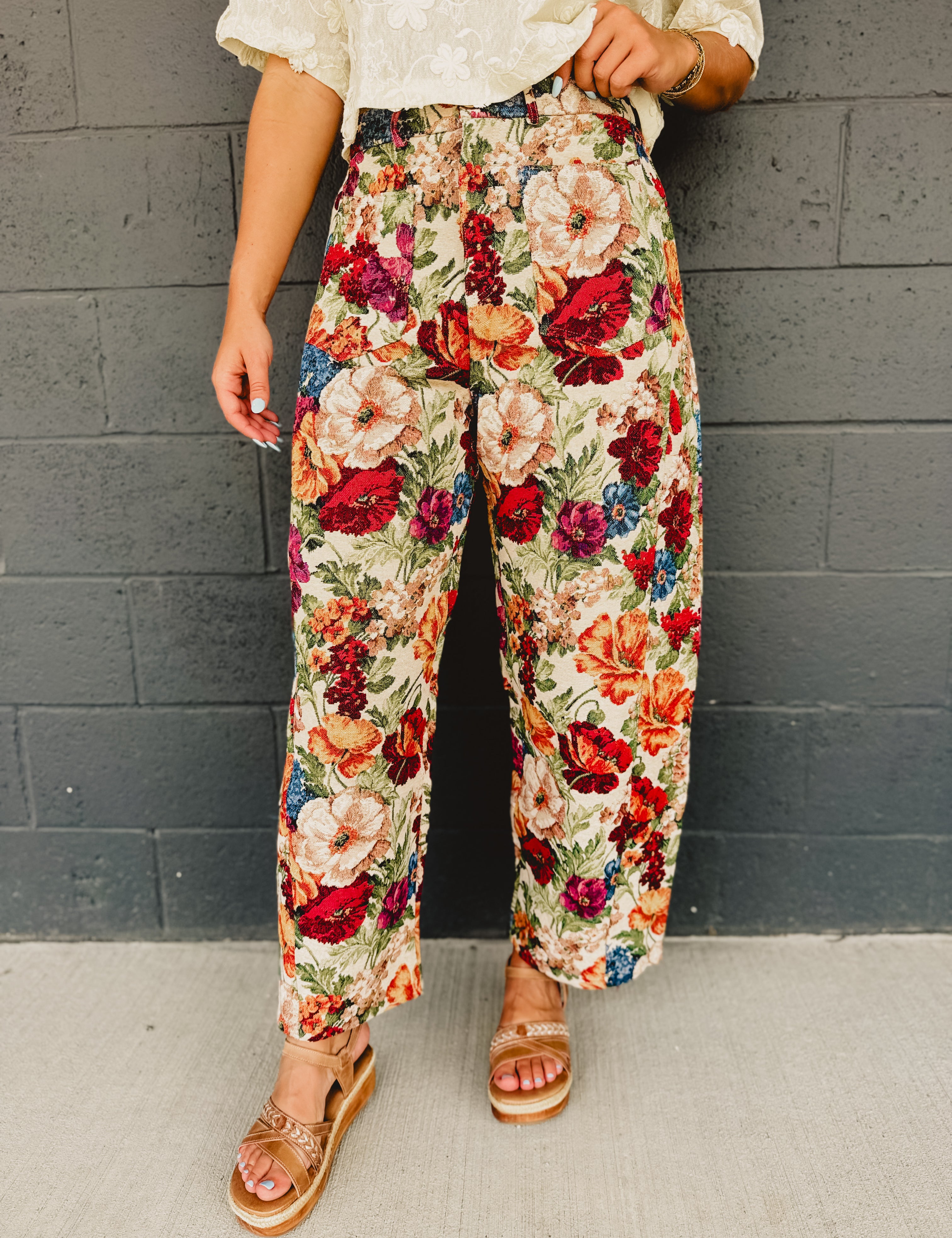 Bright colored floral jacquard barrel fit pants in multi with zip-up closure and pockets.