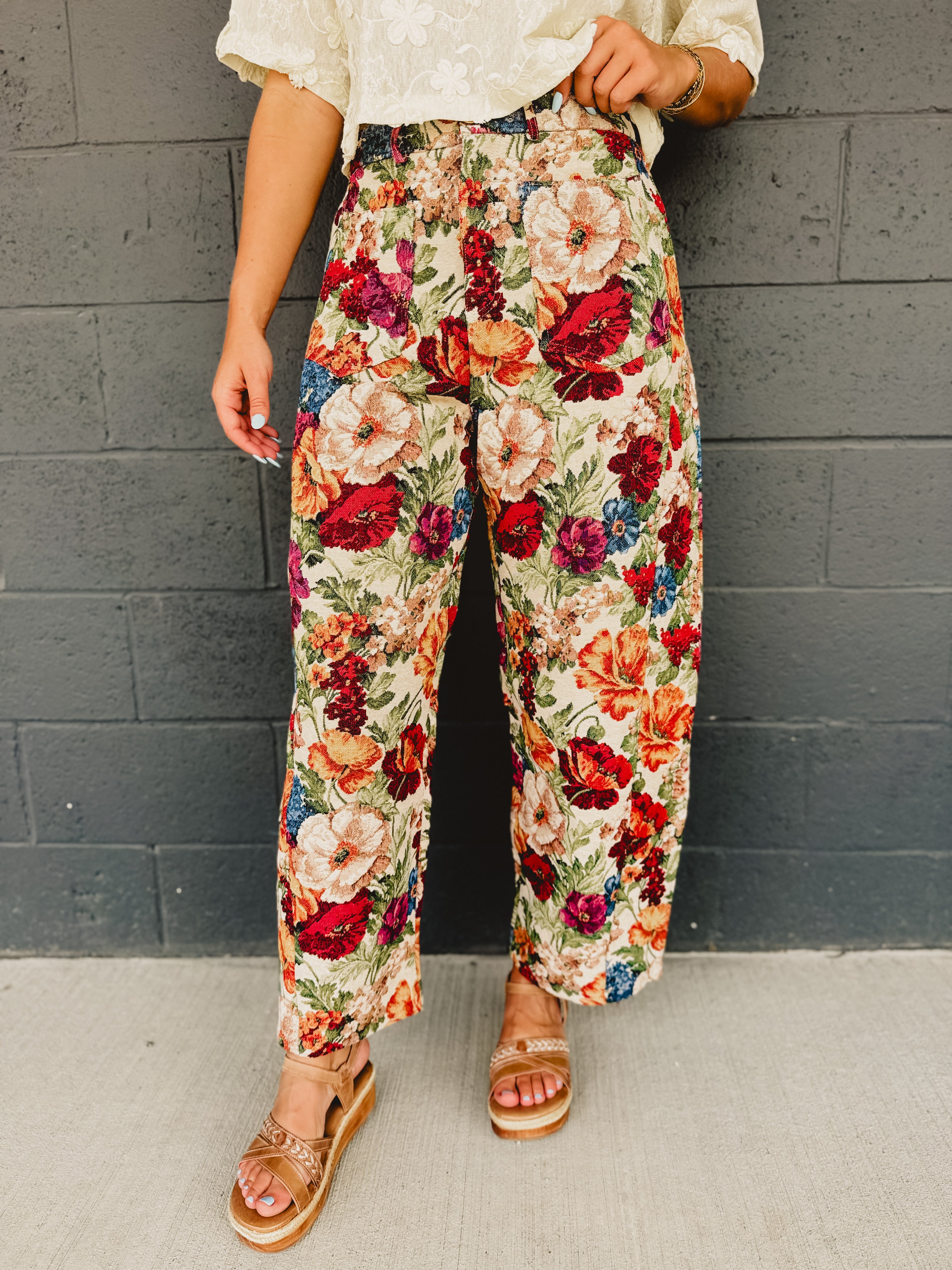 Bright colored floral jacquard barrel fit pants in multi with zip-up closure and pockets.