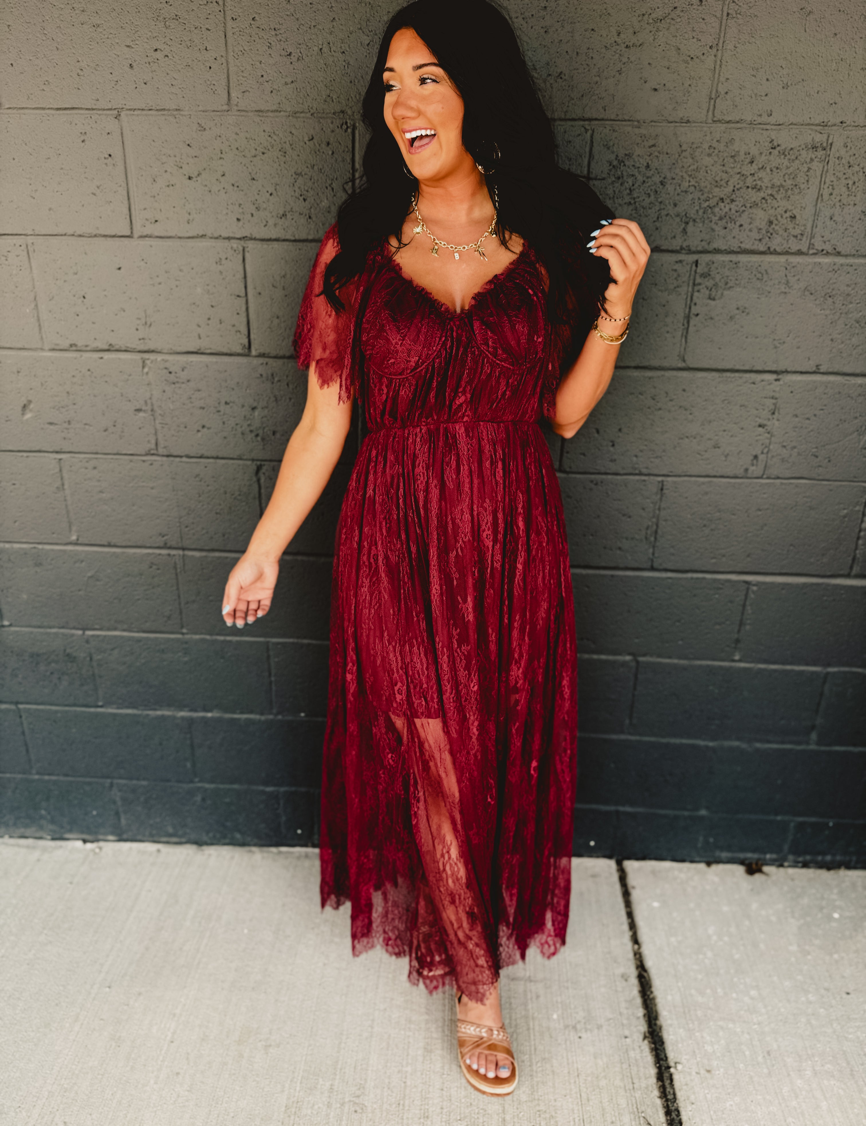 Short sleeve v-neck maxi lace overlay dress in the color wine.