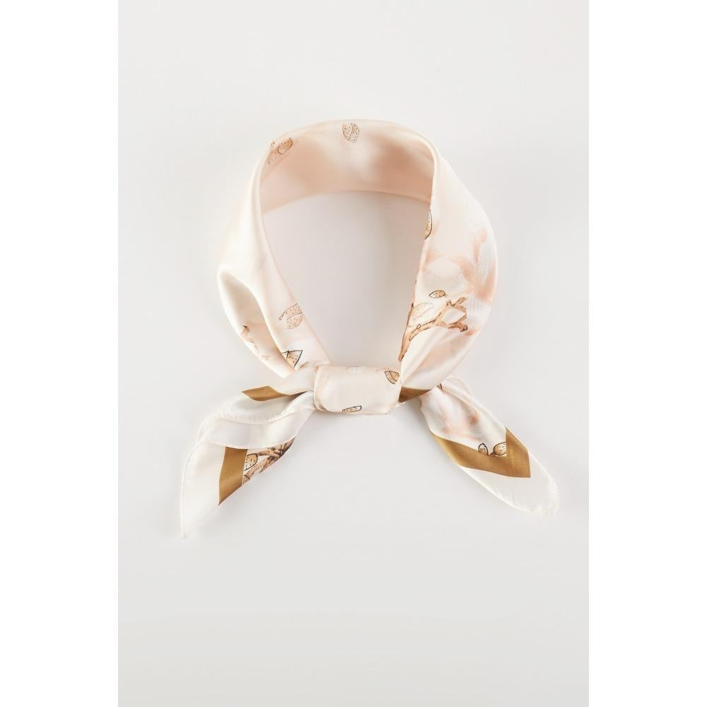 A floral printed peach colored scarf, bandana, etc.