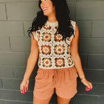 Granny square crochet sleeveless vest with a round neck in natural multicolor.