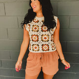 Granny square crochet sleeveless vest with a round neck in natural multicolor.