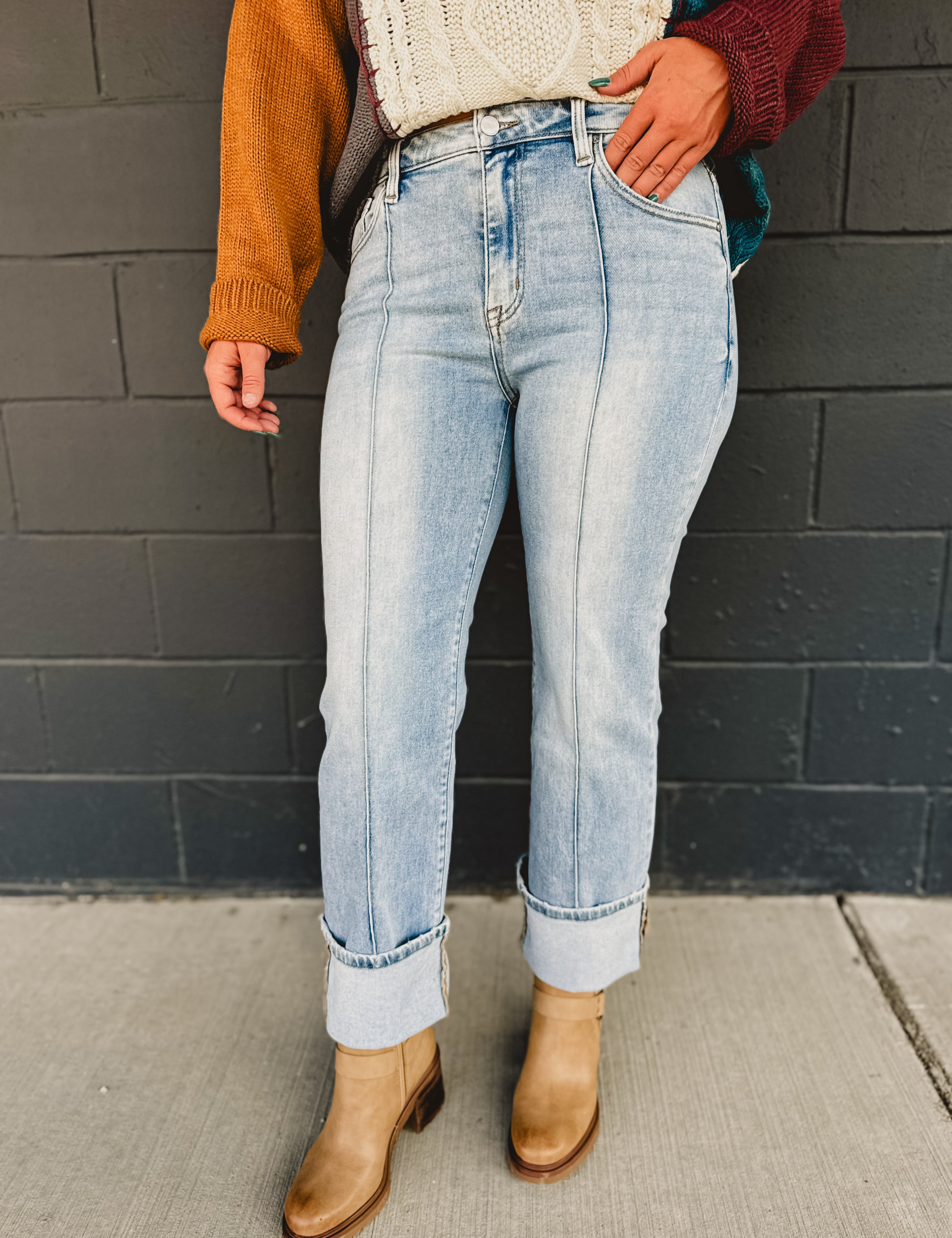 High waisted front seam cuffed straight jeans by Risen in medium denim.