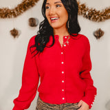 Fuzzy ribbed button down knit cardigan in red.